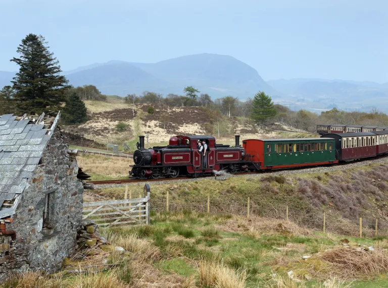 Ffestiniog Railway steam engine winds its way through the Dduallt station spiral loop 